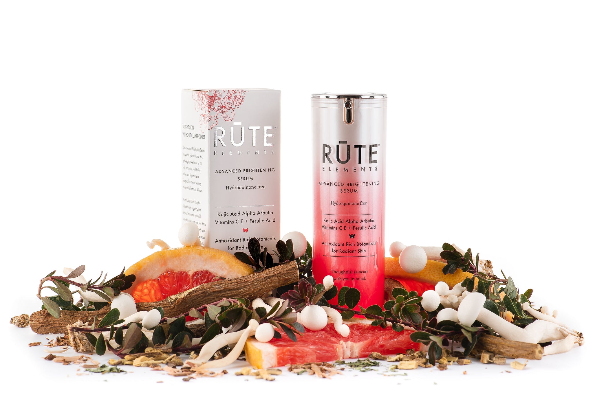 Advanced Brightening Serum bottle and a box with botanical ingredients